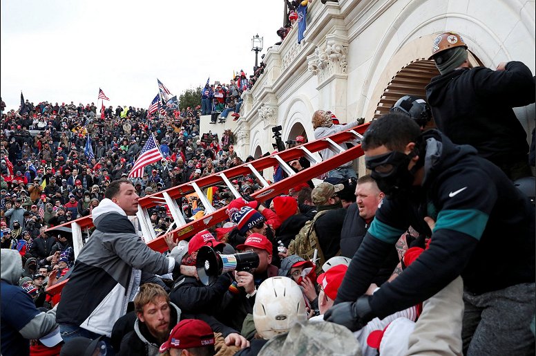 Trump's patriotic rioters breach the Capitol Police line at the U.S. Capitol Building on January 6, 2021