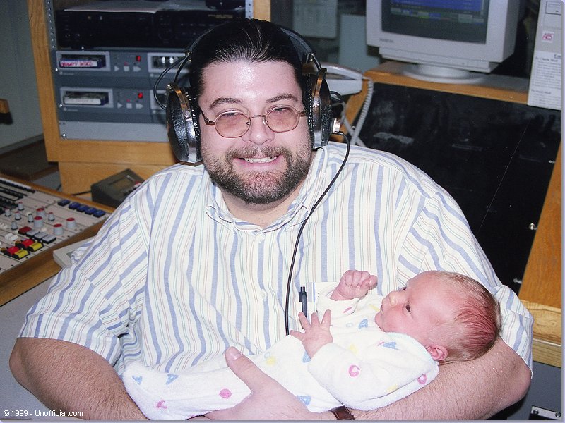 Jeff Gish with Garth and Debra's newborn son, Ethan at KLBJ-FM, Austin, Texas